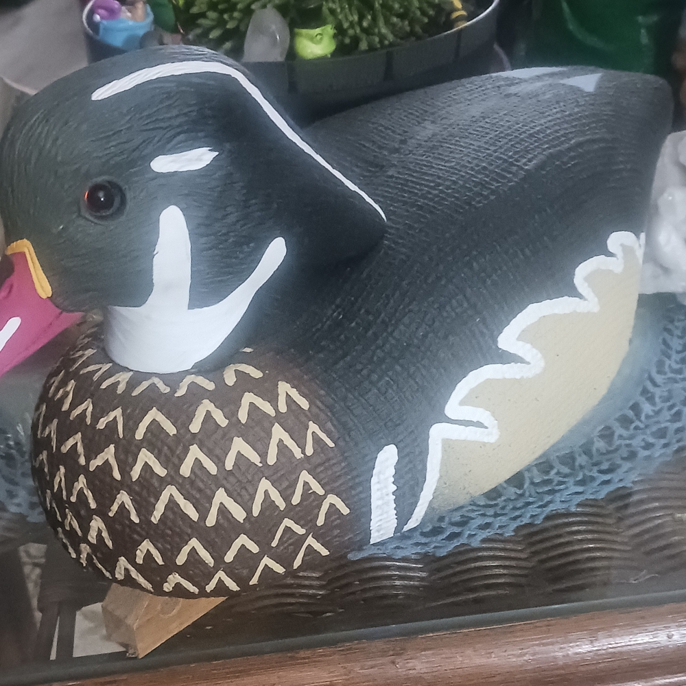 Black and Brown Art Sculpture with Geometric Patterns
